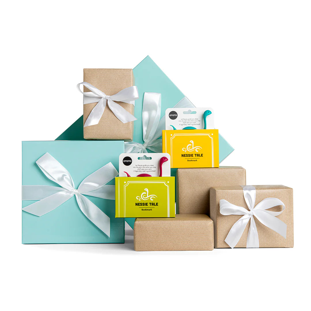 Gift-wrapped presents include two OTOTO Nessie Tale hook packages with ribbons.