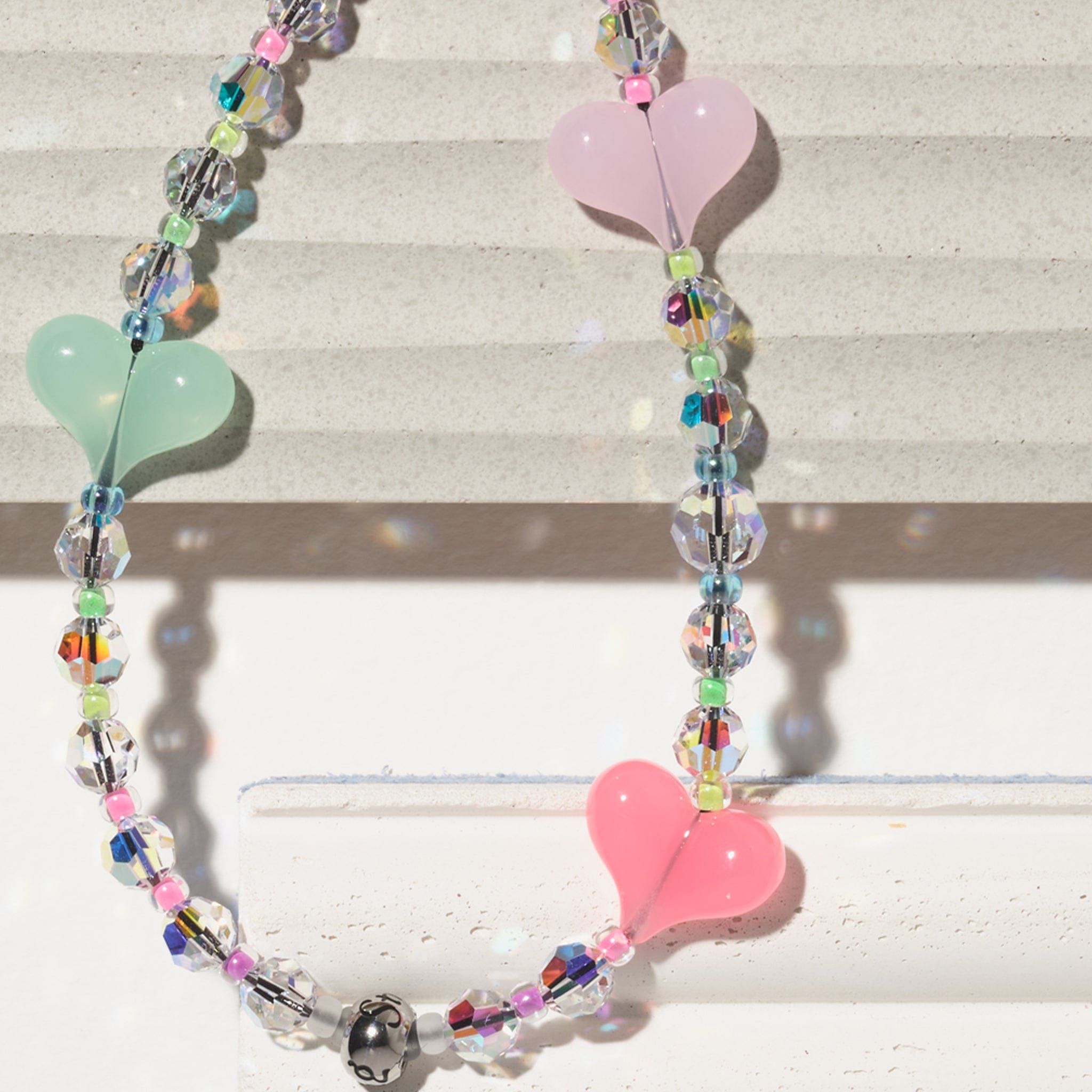 Lumi Love Club Drip Wristlet Phone Strap