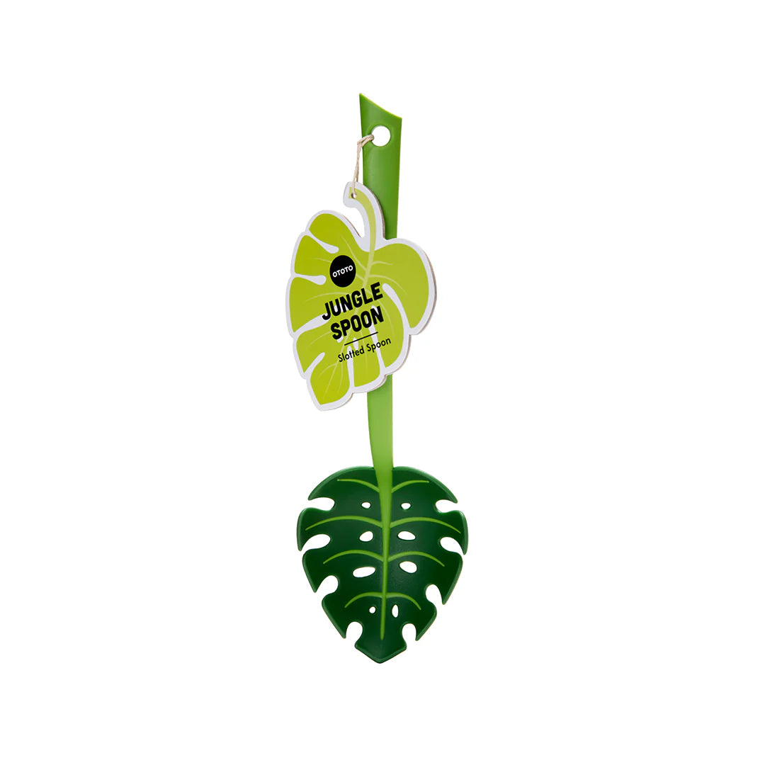 Jungle Spoon shaped like a green leaf, featuring an attached tag.