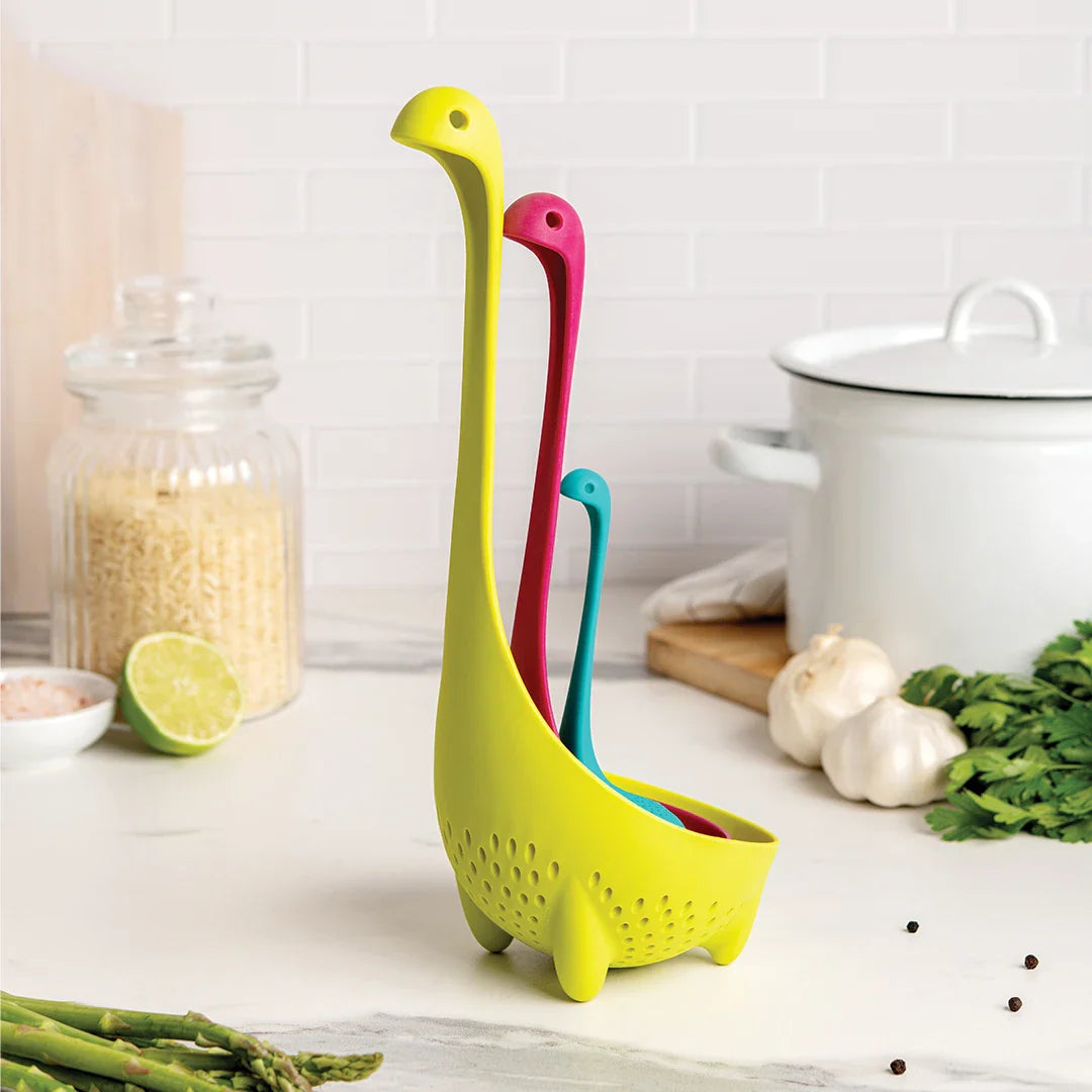 The Nessie Family gadgets offer dinosaur-shaped utensils in green, red, and blue for your counter.