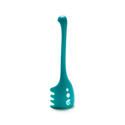 Teal OTOTO Papa Nessie pasta server, dinosaur-shaped with a long neck and side holes, stands upright.