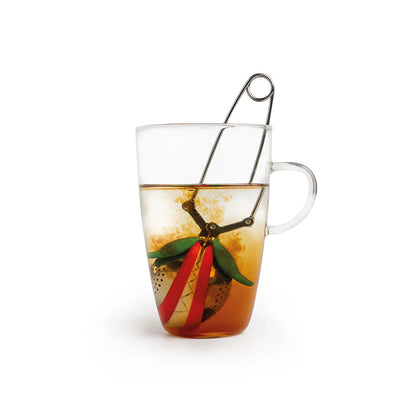 Transparent mug with the Tea Trap by OTOTO inside, steeping and swirling the fragrant brew.